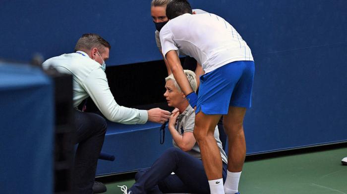 Djokivic seeing injured official